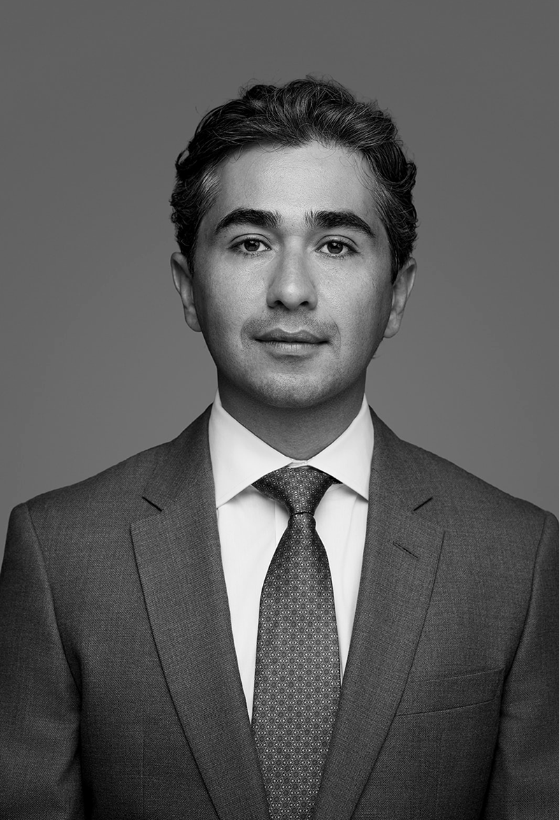 Black and white profile photo of Aidin Firouzi.